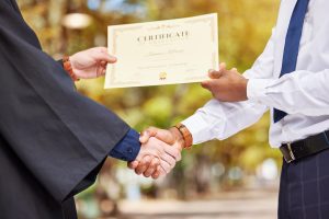 hand shake graduation and certificate for college 2023 11 27 05 22 51 utc min