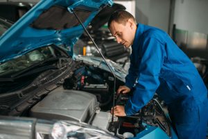 mechanic repairs car engine motor diagnostic 2023 11 27 05 36 15 utc min