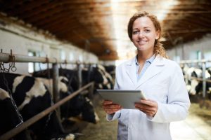 smiling veterinarian working at farm 2023 11 27 04 58 55 utc min